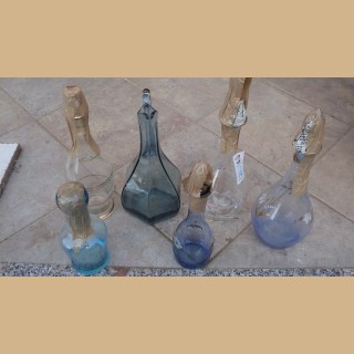 bottiglie in vetro con tappo di varie forme e modelli